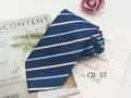 Detailed view of the dark blue striped tie, showing premium fabric texture and fine stitching. - CD-37