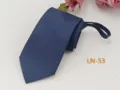 Detail view of the blue business jacquard zipper necktie showing fabric texture. - LN-53