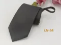 Detailed view of men's dark grey jacquard zipper necktie, formal business wear accessory. - LN-54