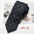 Classic blue retro medallion men's tie, detailed view showcasing vintage fabric pattern. - HFL-07