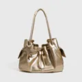 Metallic gouden slouchy dagelijks schoudertas met sterhanger en trekkoord voor dames - L / Goud