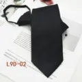Detail shot of a black zipper tie, solid color formal business design for easy daily wear. - L9D-02