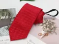 Red zipper tie detail view, elegant business casual necktie prop closeup display. - CH-23