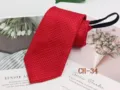 Men's red zipper tie with textured woven design, perfect for business and formal wear detail. - CH-34