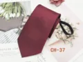 Detailed view of dark red zipper necktie with textured fabric and convenient zipper design. - CH-37