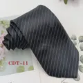 Detailed view of a classic black men's business tie featuring elegant white pinstripe patterns. - CDT-11
