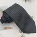 Men's dark grey jacquard woven formal business tie with white grid texture detail. - CDT-12