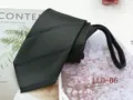 Detailed view of the black business tie, featuring neat texture and zipper design for easy wear. - LLD-06