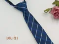 Close-up detail of blue men's striped tie, showing fine fabric texture and neat pattern. - L6L-21