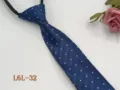 Detailed view of dark blue men's business zipper tie with white polka dots and texture. - L6L-32