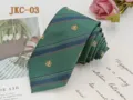 Green striped JK uniform necktie with delicate embroidery crest, stylish preppy neckwear. - JKC-03