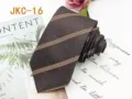Detailed shot of a classic brown striped JK uniform tie, stylish jacquard fabric accessory. - JKC-16