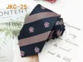 Classic JK uniform tie with jacquard stripes and crest embroidery, elegant and versatile accessory. - JKC-25