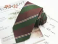 Green and brown striped necktie detail shot, casual jacquard woven fabric accessory. - JKC-32
