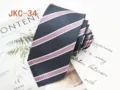 Close-up detail of the classic striped tie fabric, showing fine texture and neat lines. - JKC-34
