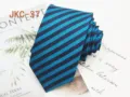 Detail view of a stylish blue and black striped tie, perfect for JK uniform and daily wear. - JKC-37