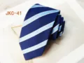 Classic blue and white striped JK uniform necktie for men and women, 7cm stylish accessory. - JKC-41