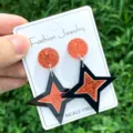 Akrylglitzer Stern Ohrringe Mode Schmuck Damen Ohrhänger in Schwarz und Orange Glitzer - Orangefarbene fein glitzernde Sternchen