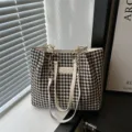 Black and white houndstooth shoulder tote bag with chain strap and leather handle chic style. - Off White