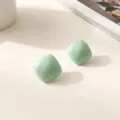 Mint green geometric resin stud earrings detail close up view, minimalist aesthetic. - Mint Green Square Copper Earrings
