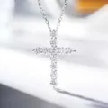 Detailed shot of a sterling silver cross pendant necklace sparkling with fine moissanite stones. - 925 Silver / Silver (XL119 High Carbon)