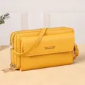 Stylish yellow women crossbody bag with multi-layer zipper compartments and front flap pocket. - Yellow
