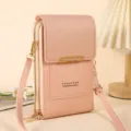 Sac bandoulière vertical rose pour téléphone portable avec double fermeture éclair et design élégant. - Rose
