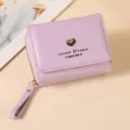 Joli portefeuille court violet clair à trois volets pour femme avec cœur et fermeture. - Violet