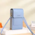 Borsa a tracolla verticale azzurra per cellulare con doppia zip e pratica patta elegante. - Blu