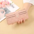 Portefeuille long matelassé rose pour femmes avec fermeture à pression et poche zippée. - Rose