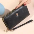 Portefeuille long femme noir double fermeture éclair en cuir PU avec motif floral gaufré. - Noir