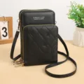 Borsa a tracolla mini nera per cellulare con zip multiple, trapuntatura e ricami. - Nero