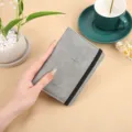 Grey PU leather passport holder with elastic band, portable travel wallet document organizer - Gray
