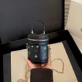 Mini black cylindrical handbag with chain strap, cute bear pattern, stylish crossbody bag. - Black