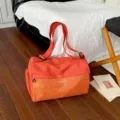 Orange large capacity travel duffel bag with checkerboard pocket for gym fitness and short trip - Orange