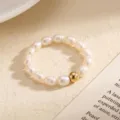 Bague en perles d'eau douce avec perle dorée, variante élégante, bijou chic et minimaliste. - Taille US 6 / Bague Perlée à Perle Artificielle