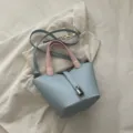 Chic solid color bucket bag with pink handles and lock decor, stylish women shoulder bag. - Blue & Pink