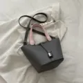 Stylish women's bucket bag with contrast pink handles and chic metal padlock detail sku. - Grey and Pink