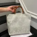 Bolso de mano de encaje estilo chino con asa de bambú elegante bolso de noche nuevo - Blanco