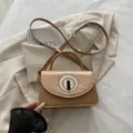 Brown patent leather mini shoulder bag for kids, chic small square crossbody bag with metal lock. - Khaki