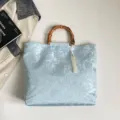 Sac à main style chinois en lin avec poignée en bambou et pompon, fourre-tout bleu clair. - Avec Pendentif / Bleu