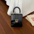 Minimalist casual small square handbag for women, stylish black crossbody bag with chic golden lock. - Black