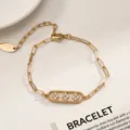 Elegante bracciale con catena paperclip placcato oro con luminosi motivi a trifoglio in zircone. - Stile Quadrifoglio Oro