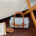 Stylish blue denim pillow bag with brown leather handles and decorative belt detail, crossbody. - No Pendant / Brown