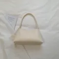Minimalist beige PU leather underarm shoulder bag for women, stylish daily commute handbag. - White