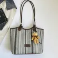 Casual striped straw woven tote bag with cute bear pendant, large capacity summer beach shoulder bag. - Style One With Bear Charm / Brown