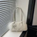 Chic off-white shoulder pillow bag for women, stylish commute handbag with pearl bow pendant. - White With Pendant