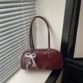 Burgundy shoulder pillow bag, stylish PU leather handbag with elegant pearl bow pendant. - Red with Pendant