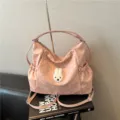 Zaino da donna a pois rosa elegante borsa a tracolla casual con toppa di coniglio. - Rosa senza ciondolo