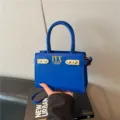 Fashionable blue women handbag with top handles and shoulder strap, stylish daily shoulder bag. - Blue